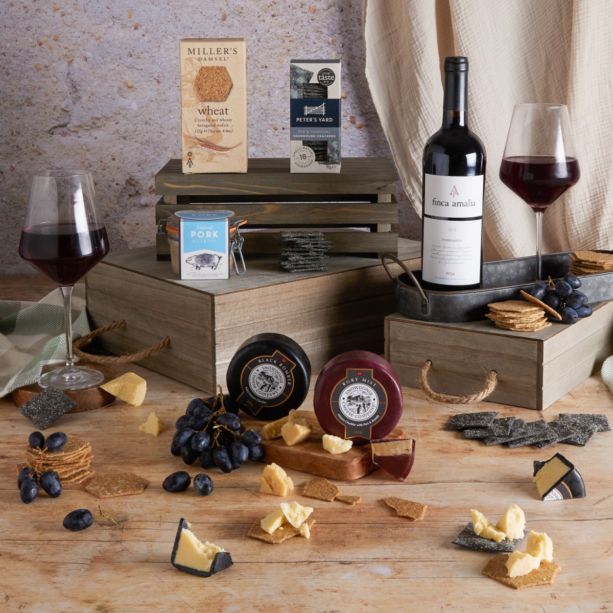 Wine, Cheese and Rillette Hamper with contents on display
